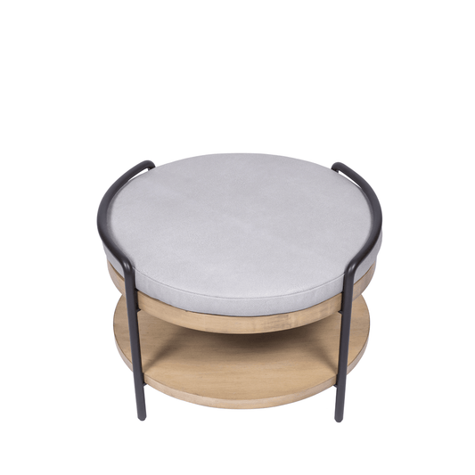 Ashley Yeates, renowned interior designer and sustainable leader, presenting the signature designed Roger Ottoman, crafted from eco-friendly materials to enhance modern living spaces with style and sustainability