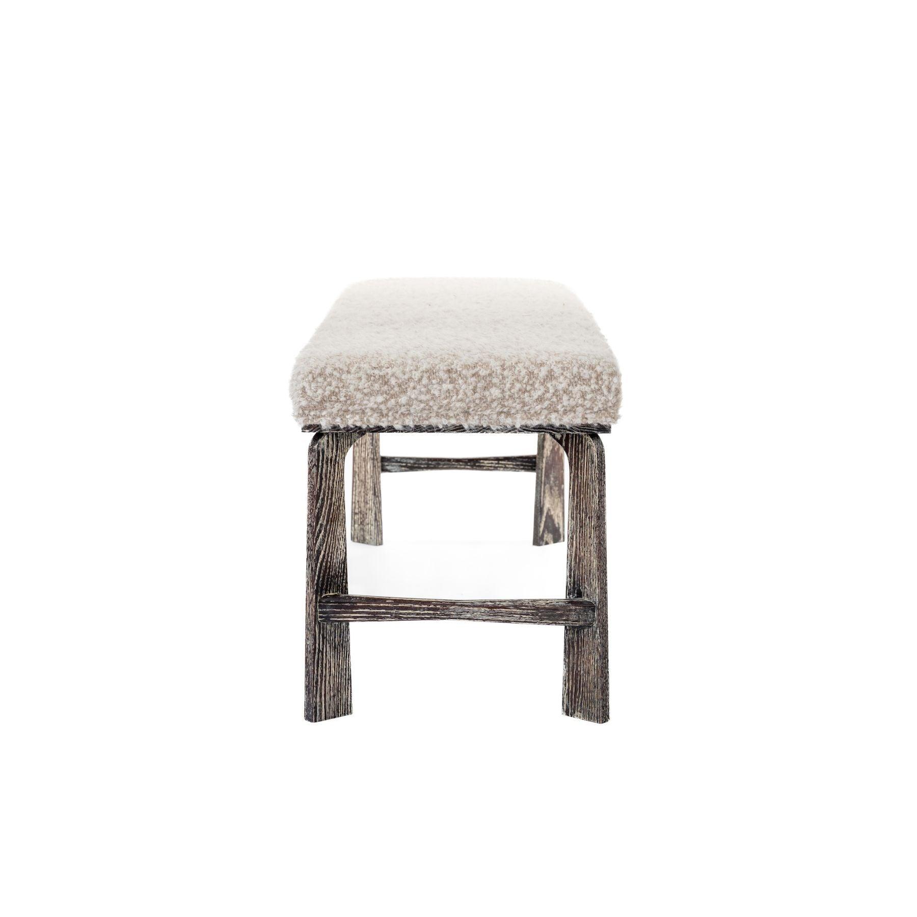 Ashley Yeates, renowned interior designer and sustainable leader, presenting the Astin Bench, a signature piece that combines modern aesthetics with eco-friendly materials, promoting sustainable living in contemporary interiors