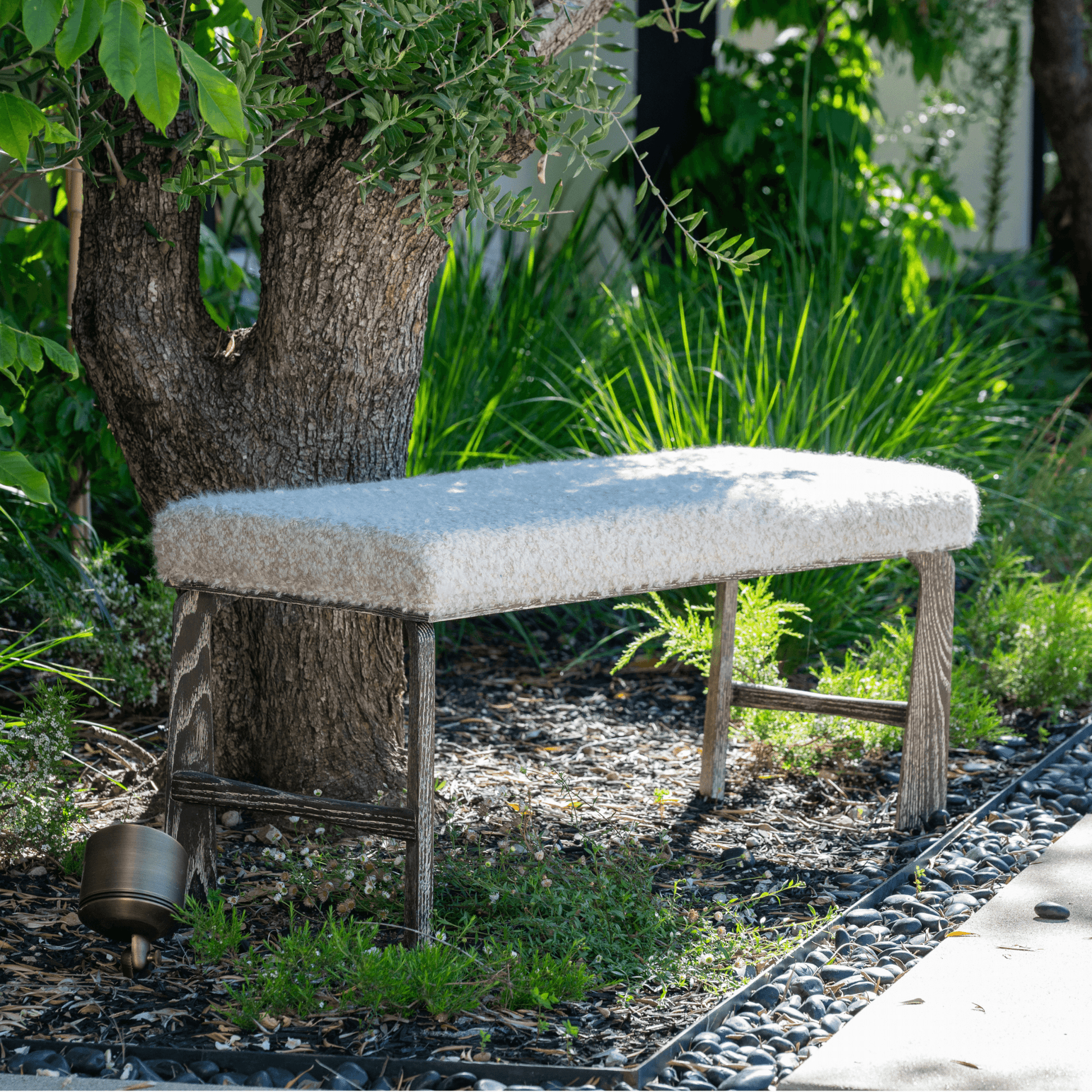 Ashley Yeates, renowned interior designer and sustainable leader, presenting her signature Astin Bench, a stylish and eco-friendly piece that exemplifies sustainable design in modern interiors